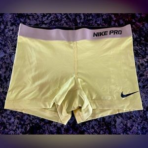 neon yellow nike pro shorts women size M